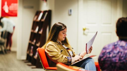 student reviewing papers